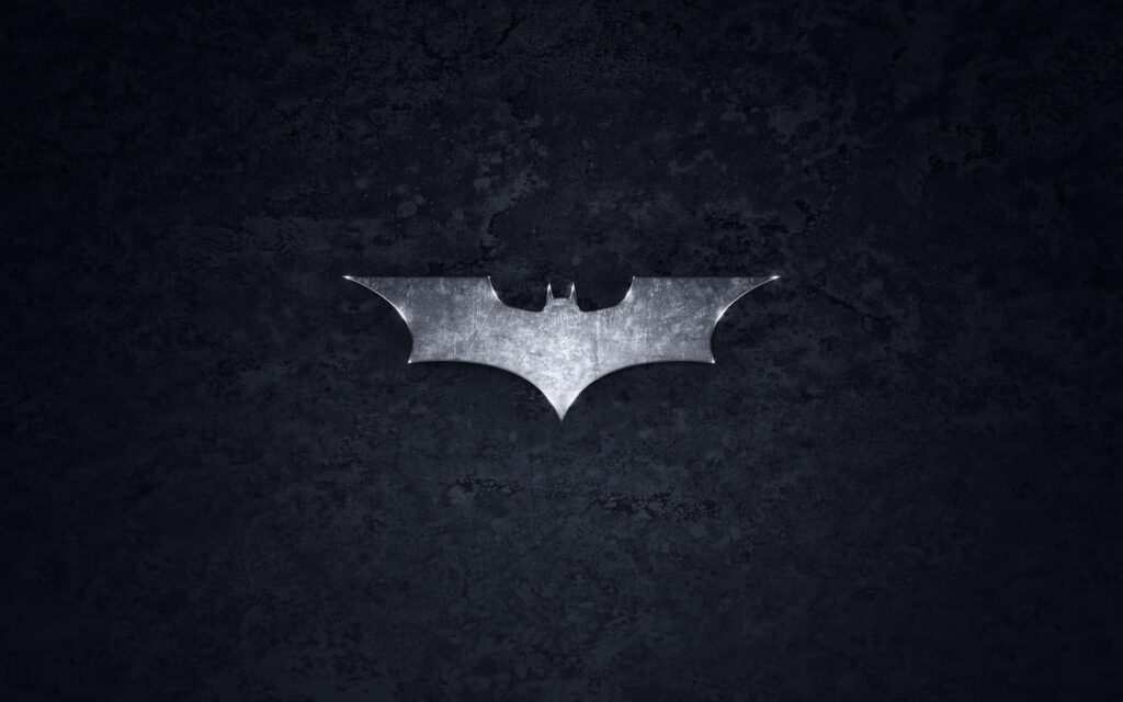 Silver Batman logo on dark textured background minimalist superhero desktop wallpaper