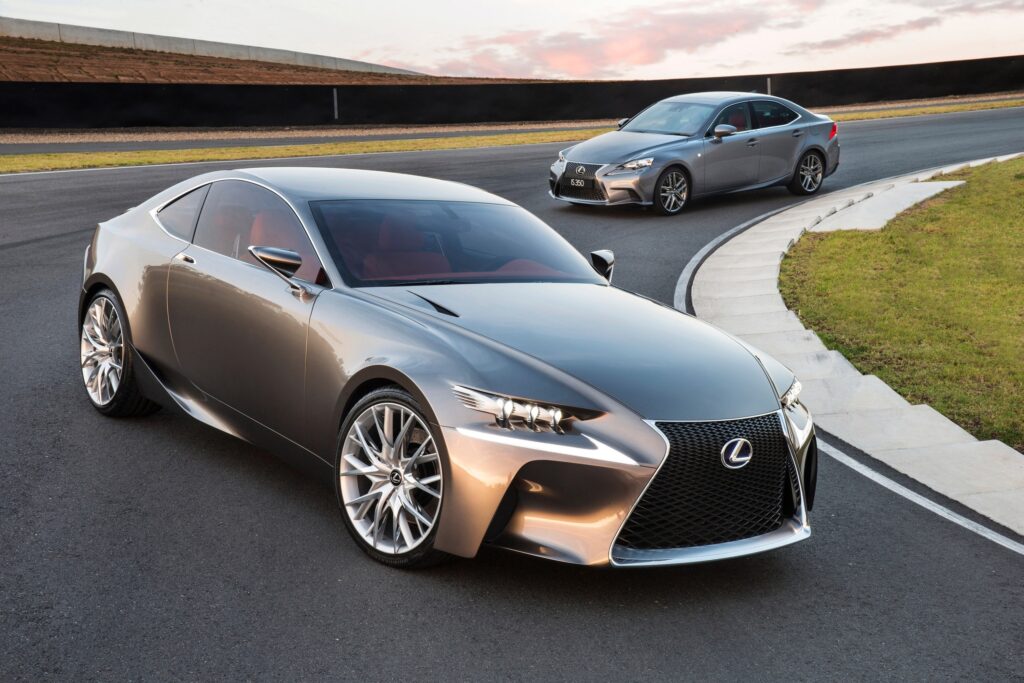 Sleek Silver Lexus LF-CC Concept Car on Scenic Roadway Wallpaper