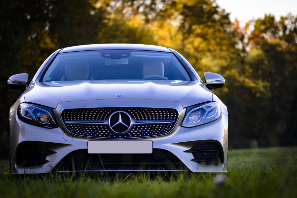 Sleek Silver Mercedes-Benz Wallpaper: Modern Design & Greenery