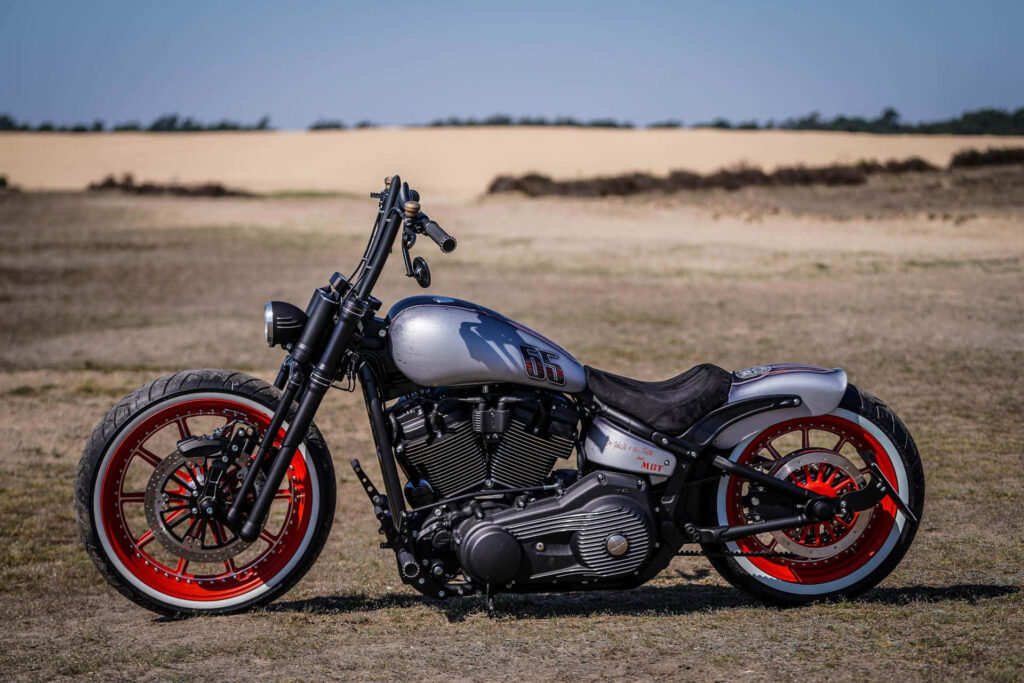 Sleek Silver Motorcycle Wallpaper: Full Throttle Adventure Background