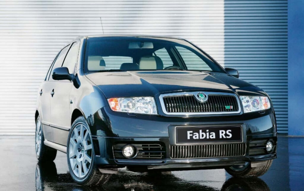Elegant Skoda Fabia RS Wallpaper: Sleek Design in Urban Setting
