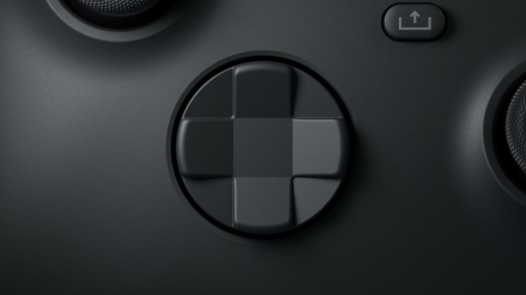 Precision in Grey: Close-Up of Xbox Series X Controller's D-Pad Wallpaper