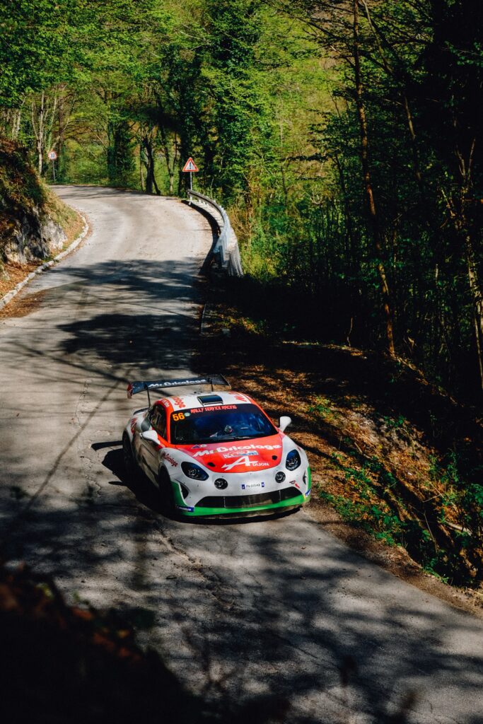 Vibrant Sports Car Racing Wallpaper: Thrilling Nature Scene