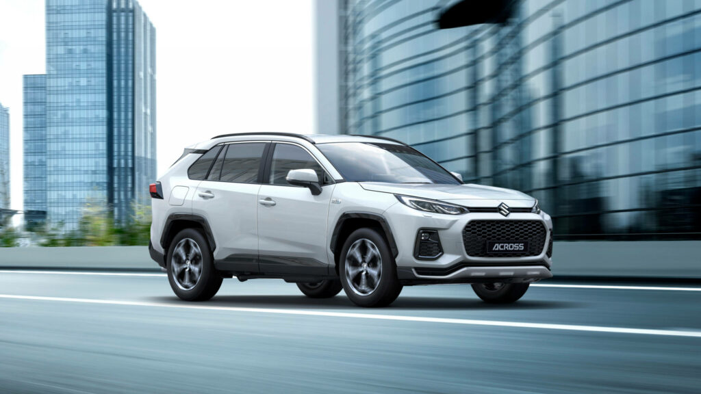 Suzuki Across SUV Wallpaper: Modern Design on Urban Roads
