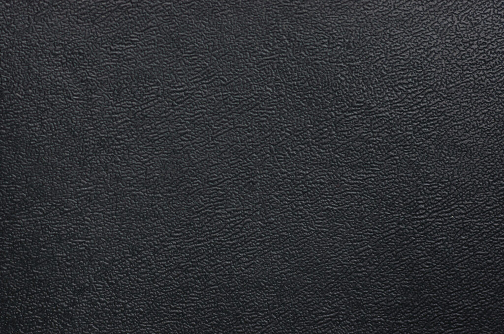 Textured Black Leather Wallpaper Background for Elegant Designs