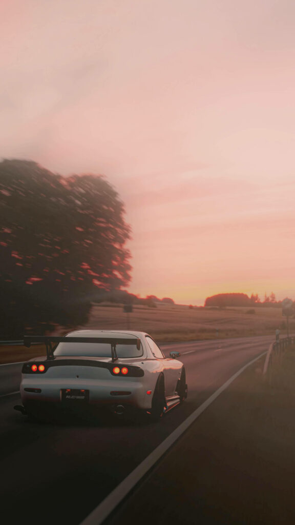 Sleek white car driving on open road at sunset dynamic serene wallpaper background