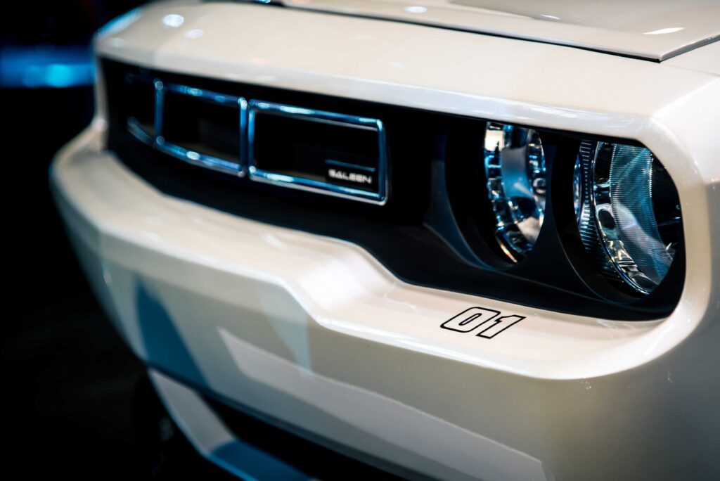Modern White Car Wallpaper: Sleek Design, Unique Grille & Headlights