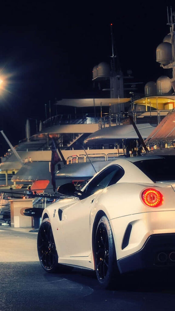 Sophistication on Wheels: Unveiling the Sleek White Ferrari Phone that Puts Your Style in the Fast Lane Wallpaper