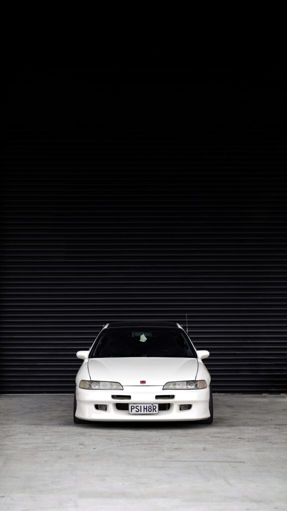 Sleek White Honda Integra: Sporty Design on Dark Minimalist Background Wallpaper