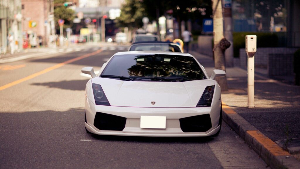 Sleek White Lamborghini Wallpaper: Urban Elegance & Modern Design