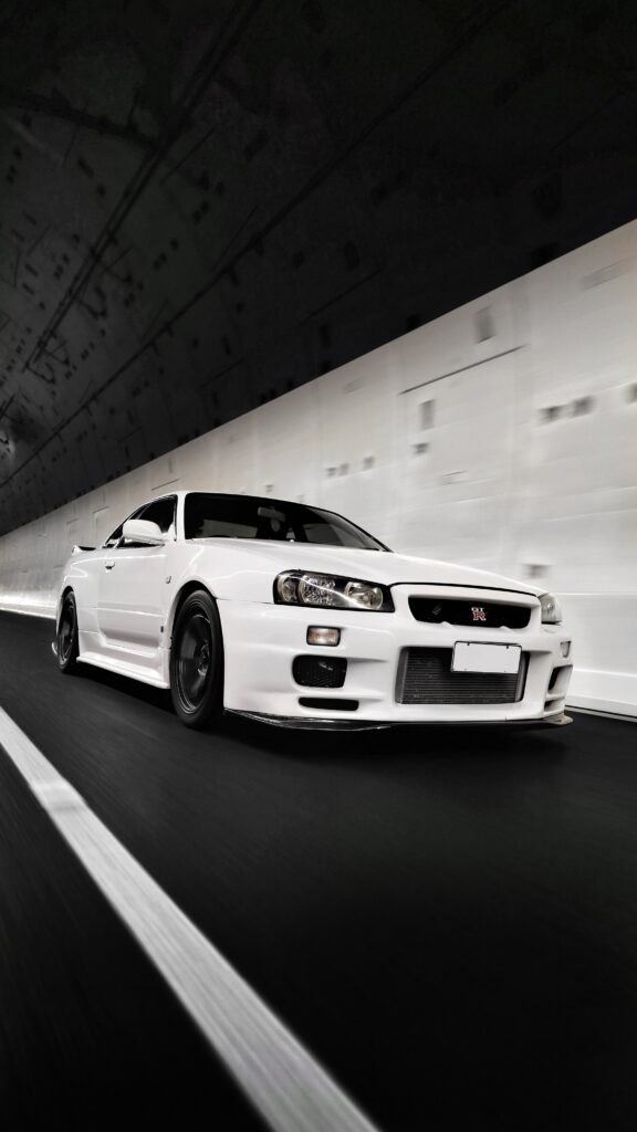 Dynamic White Nissan GT-R Wallpaper: Sleek Design in Motion