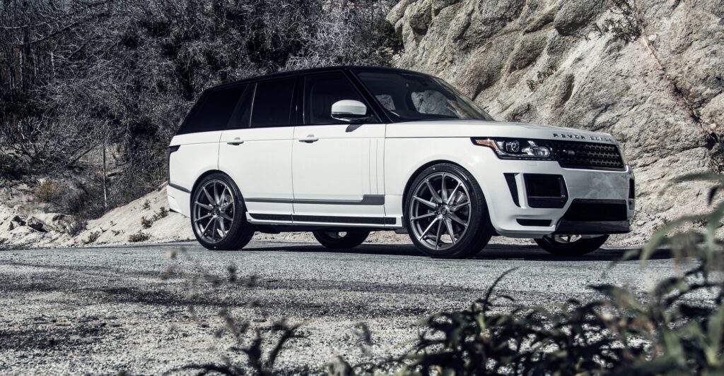 White Range Rover Vogue: Luxury & Off-Road Elegance in Nature Wallpaper