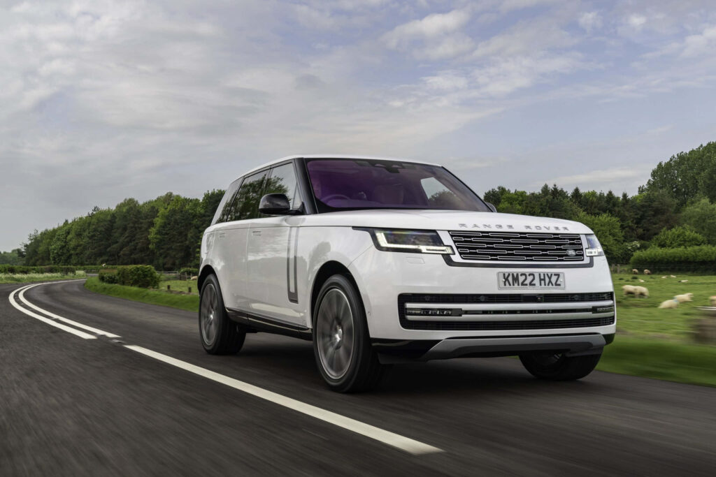 Sleek White Range Rover Wallpaper: Serene Country Road & Greenery