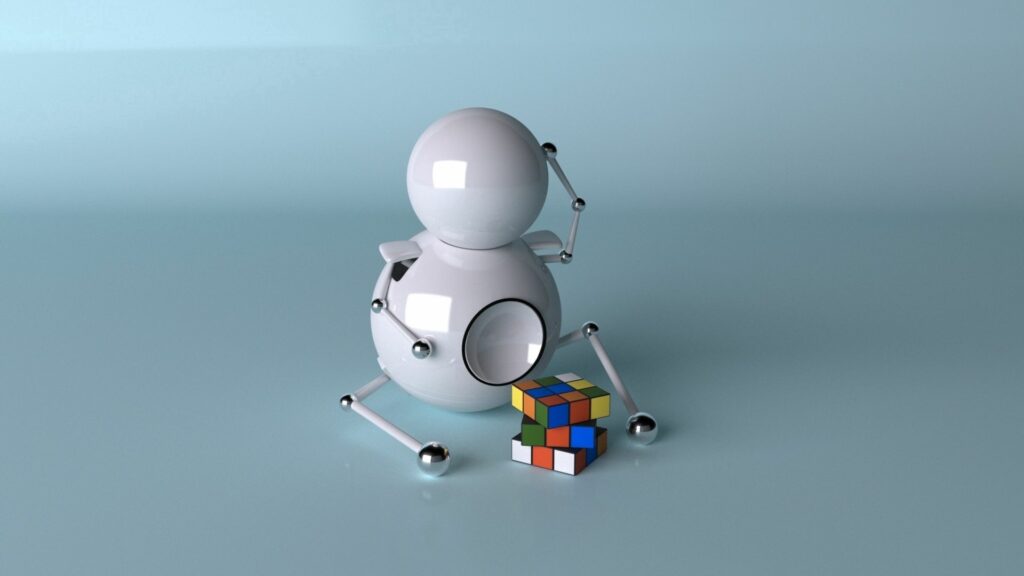 Sleek White Robot on Reflective Surface with Rubik's Cube Wallpaper