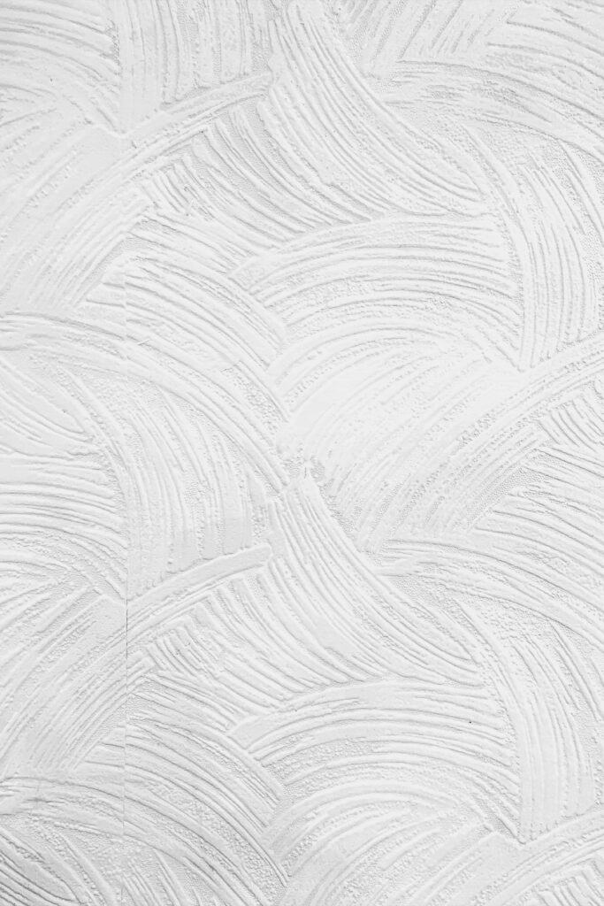 Sleek White Background with Elegant Curved Line Patterns Wallpaper