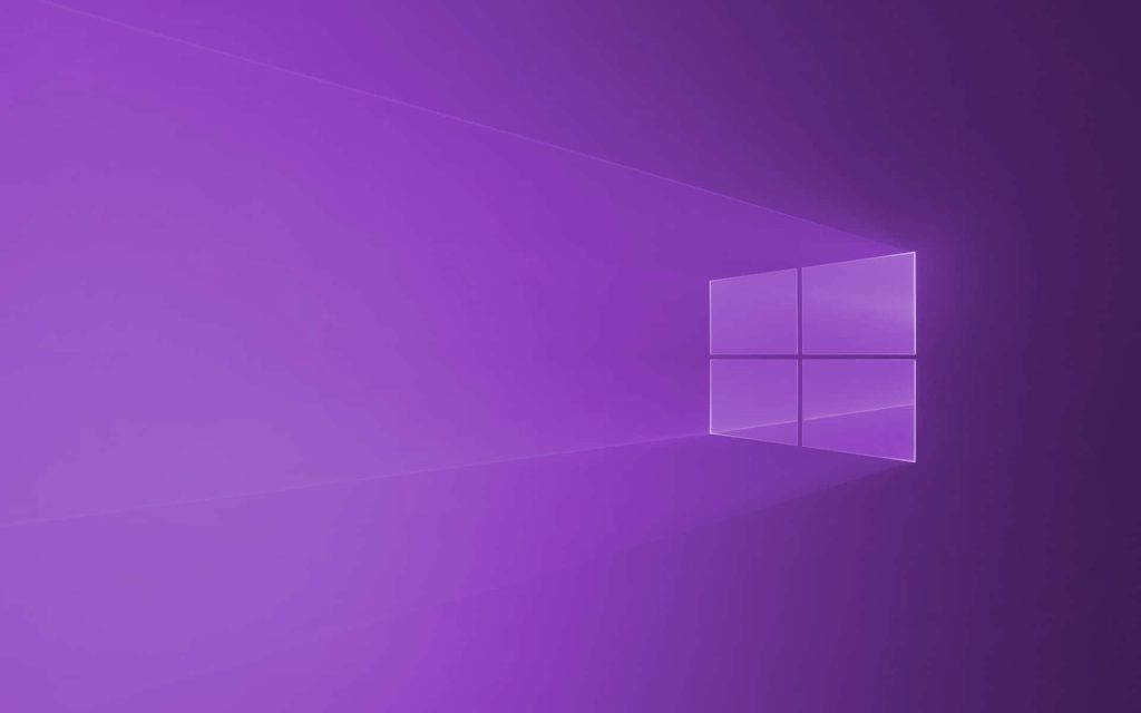 Windows logo wallpaper with vibrant purple gradient and soft lighting digital art background