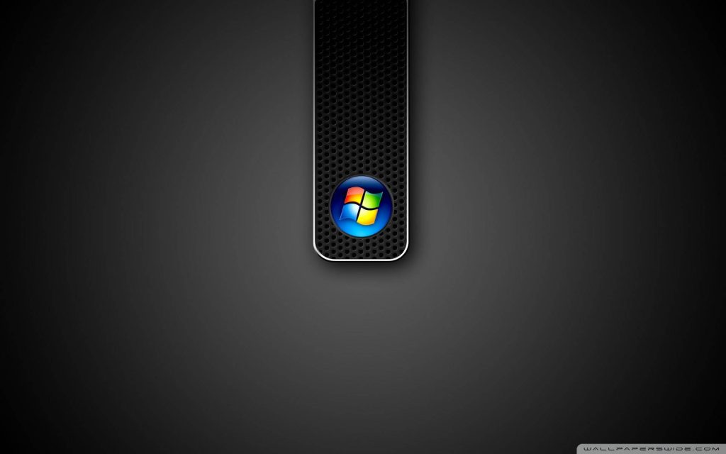 Windows Vista orb on black perforated mesh strip with dark gradient minimalist wallpaper background