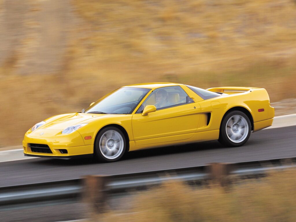 Vibrant Yellow Acura NSX in Motion - Sleek Side View Wallpaper