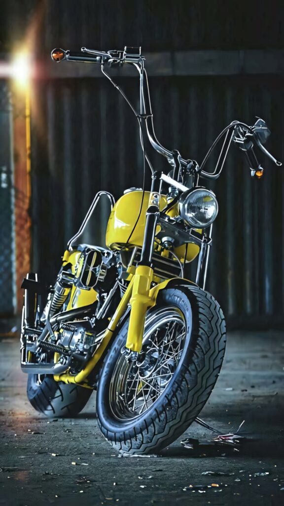 Sleek Yellow Motorcycle Wallpaper - Dimly Lit Garage Ambiance