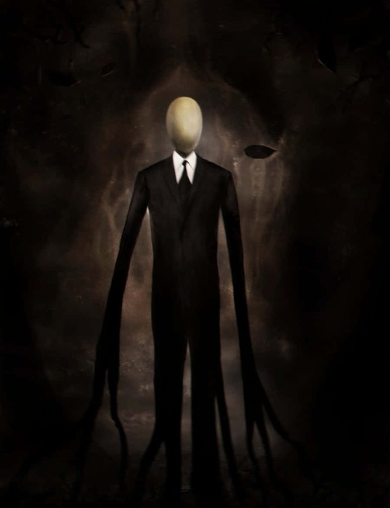 Eerie Slender Man digital art with faceless figure and tendril limbs on dark spooky background Wallpaper
