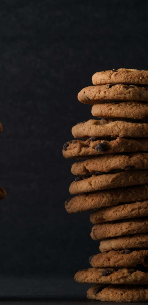 Elegant Charm of a Chocolate Chip Cookie Stack Wallpaper