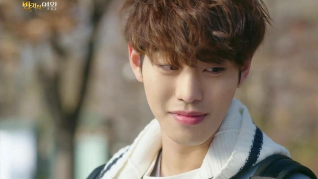Ahn Hyo-seop smiling outdoors with soft natural light warm charming expression wallpaper background