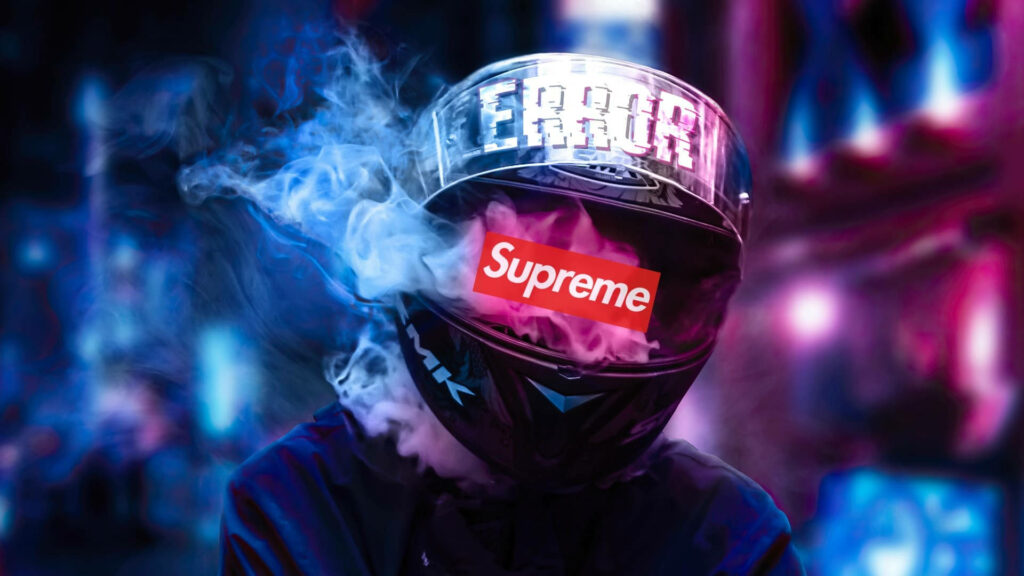 Stylish Individual Sporting a Supreme-Branded Smoking Helmet in a Striking Background Wallpaper