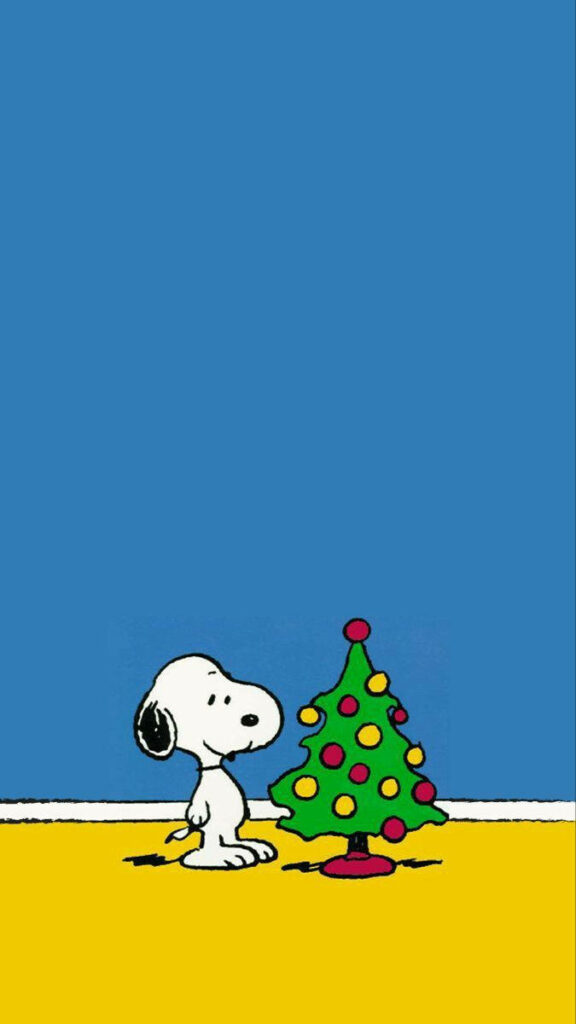 Snoopy Christmas Wallpaper with Festive Tree on Blue Background