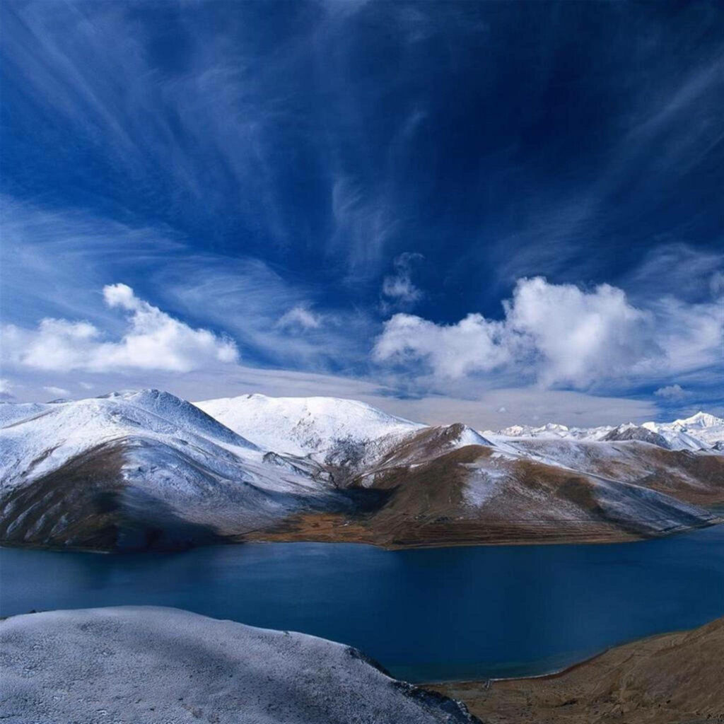 Majestic Morning: a Scenic Snowy Mountain and Lake under a Beautiful Sky – iPad Pro Wallpaper