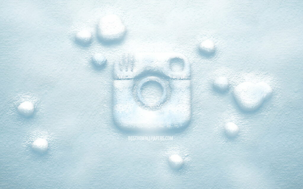 3D Instagram logo embossed in frosty snow textured winter wallpaper background desktop art