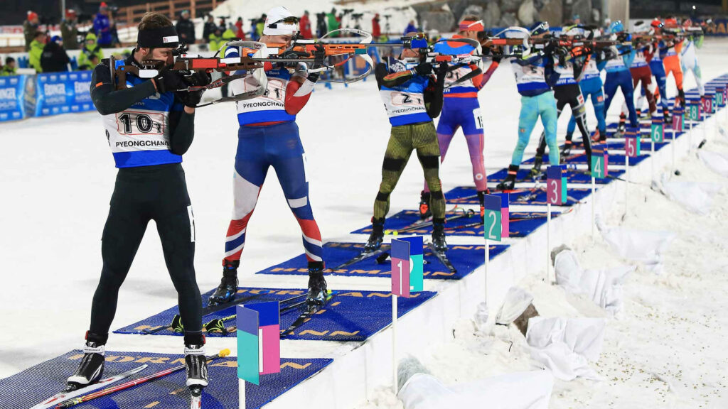 Snowy Olympic Sport Rifle Shooting Wallpaper: Precision & Focus