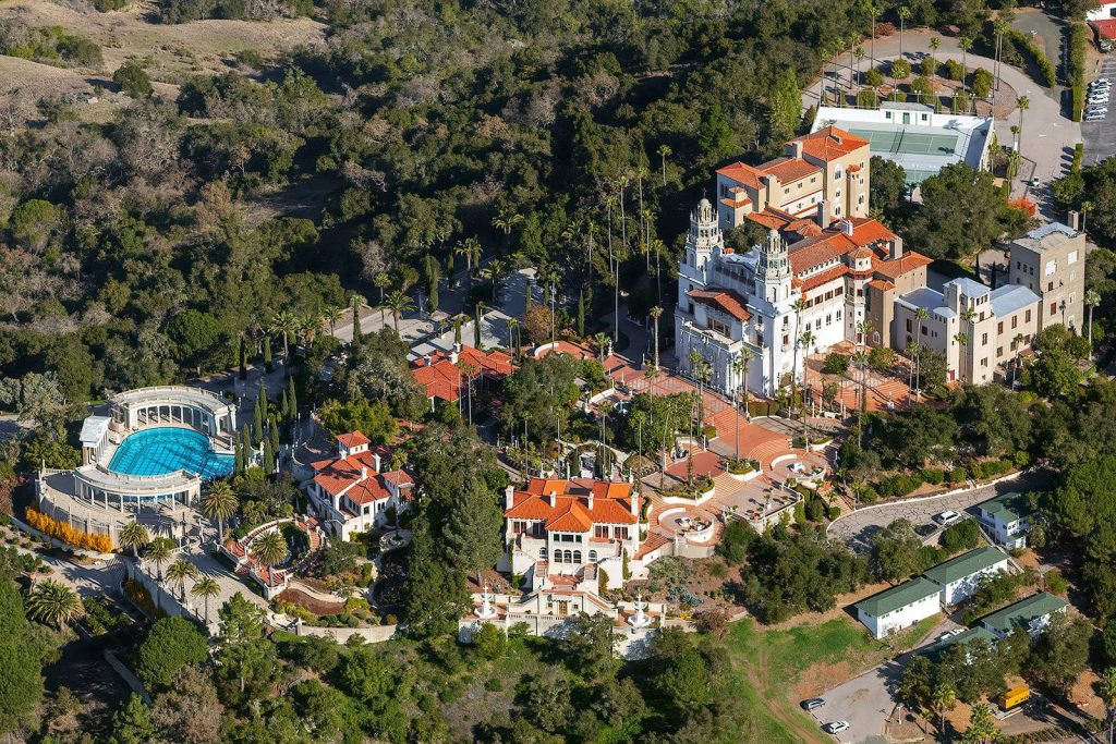 Aerial view of Hearst Castle Neptune Pool red tile roofs Mediterranean architecture trees Wallpaper