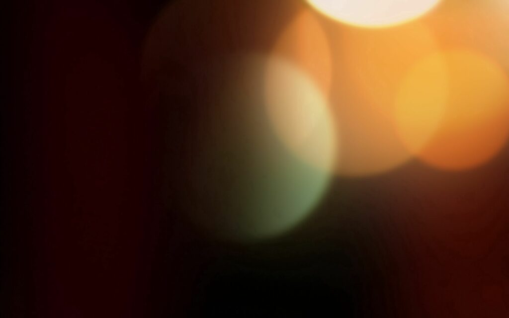 Tranquil Bokeh Background: Soothing Colorful Light Glow Wallpaper