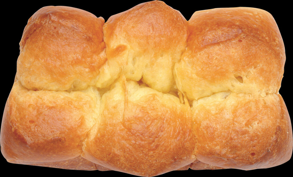 Close-Up of Golden-Brown Baked Dinner Rolls - Appetizing Wallpaper