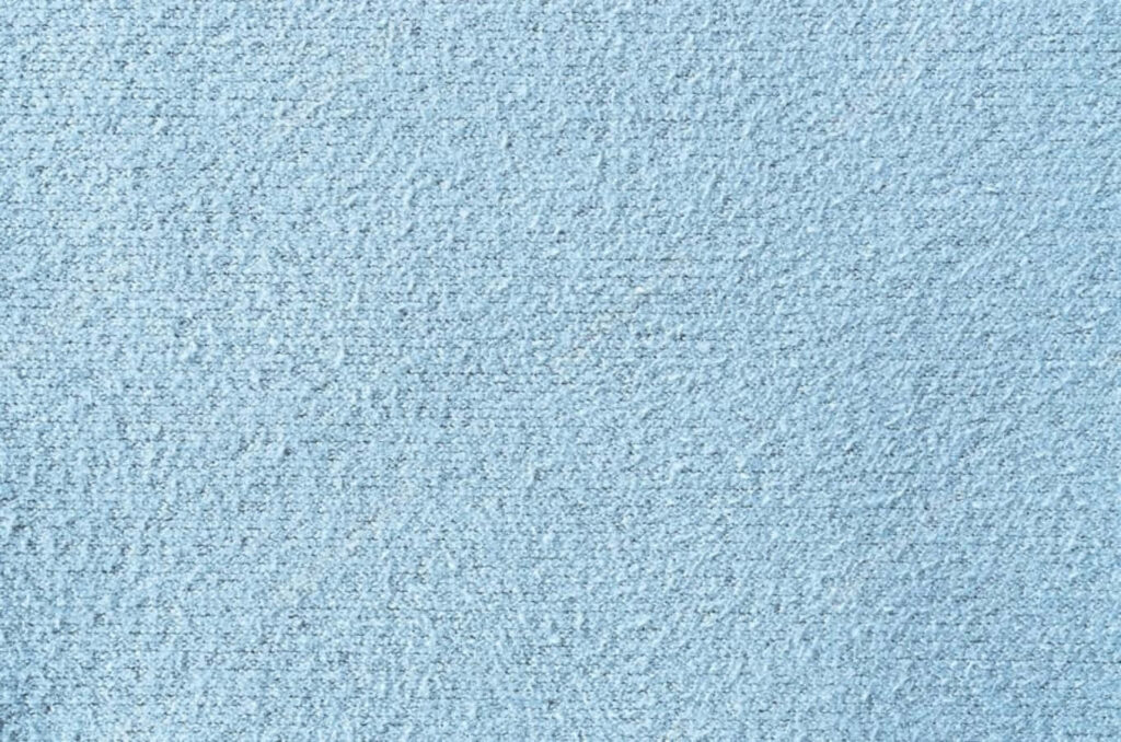Soft Light Blue Fabric Texture Wallpaper – Close-Up with Woven Details