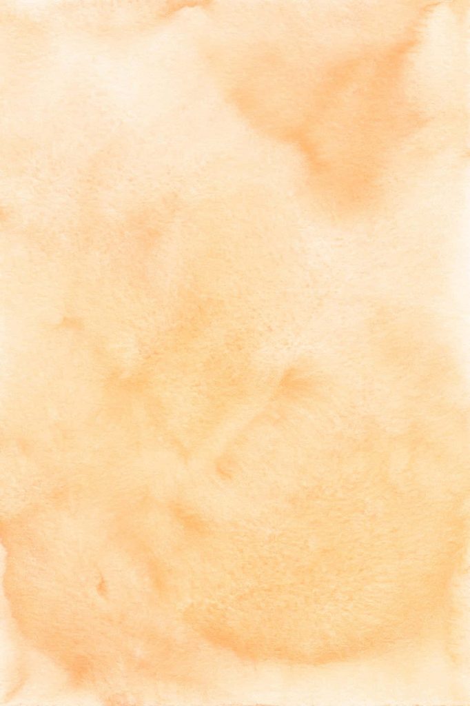 Light orange watercolor wallpaper with soft blended peach hues for a warm minimalist background