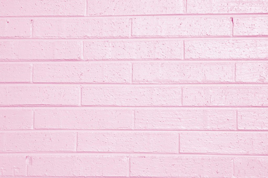 Soft pink textured brick wall wallpaper minimalist pastel background for stylish screens