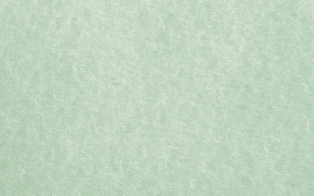 Soft sage green textured wallpaper with subtle mottled fabric-like minimalist background