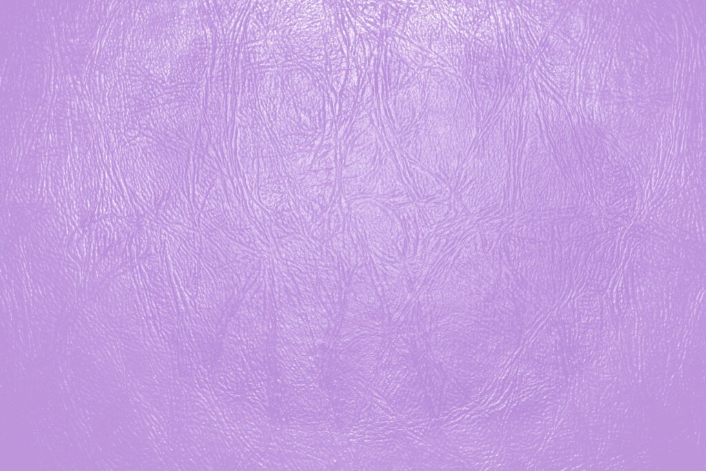 Purple Haze: A Close-Up View of Light Purple Leather Texture Wallpaper