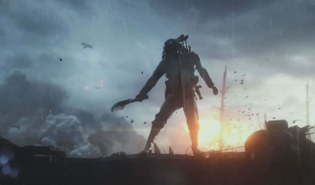 Battlefield Warrior: A Camouflaged Soldier Amidst the Chaos Wallpaper
