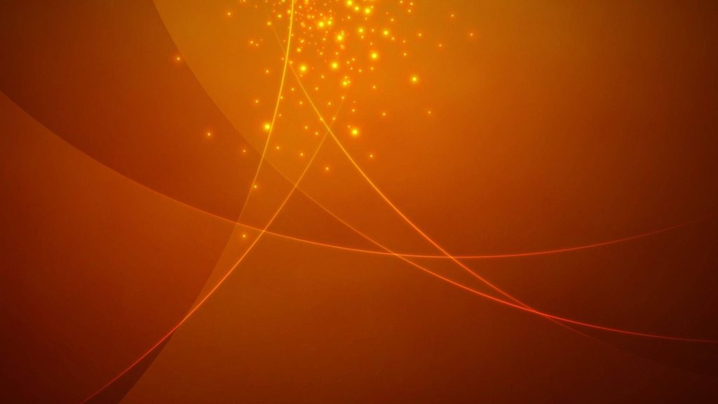 Solid sparkly orange desktop wallpaper with warm gradient and flowing curved lines design
