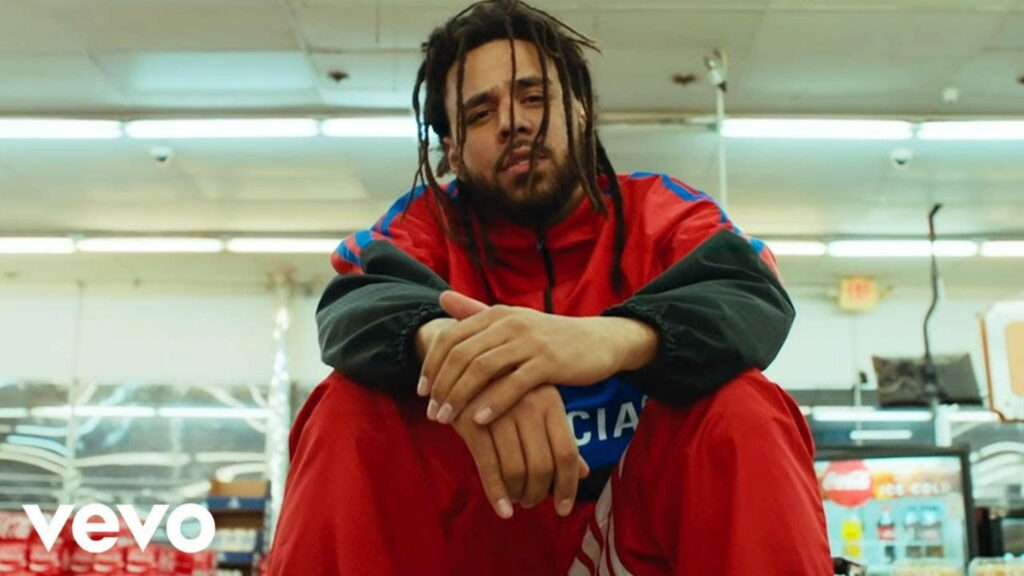 J. Cole: The Musical Maestro Shaping the Rap Industry - Vibrant QHD Wallpaper for Fans