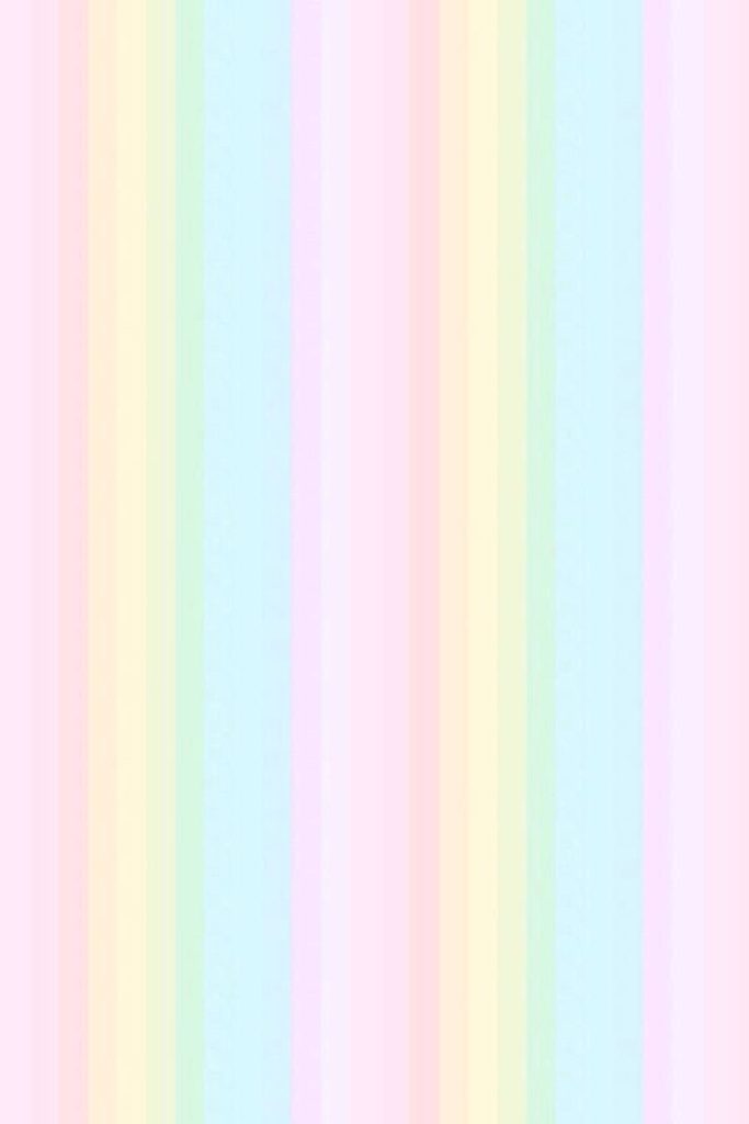 Pastel rainbow wallpaper with vertical stripes in pink yellow mint and blue minimalist background