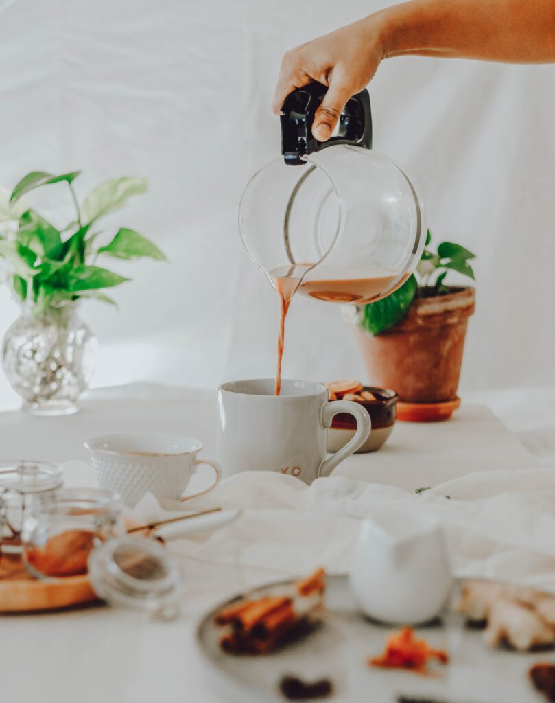 Serene Tea Scene: Relaxing Wallpaper with Spices & Greenery