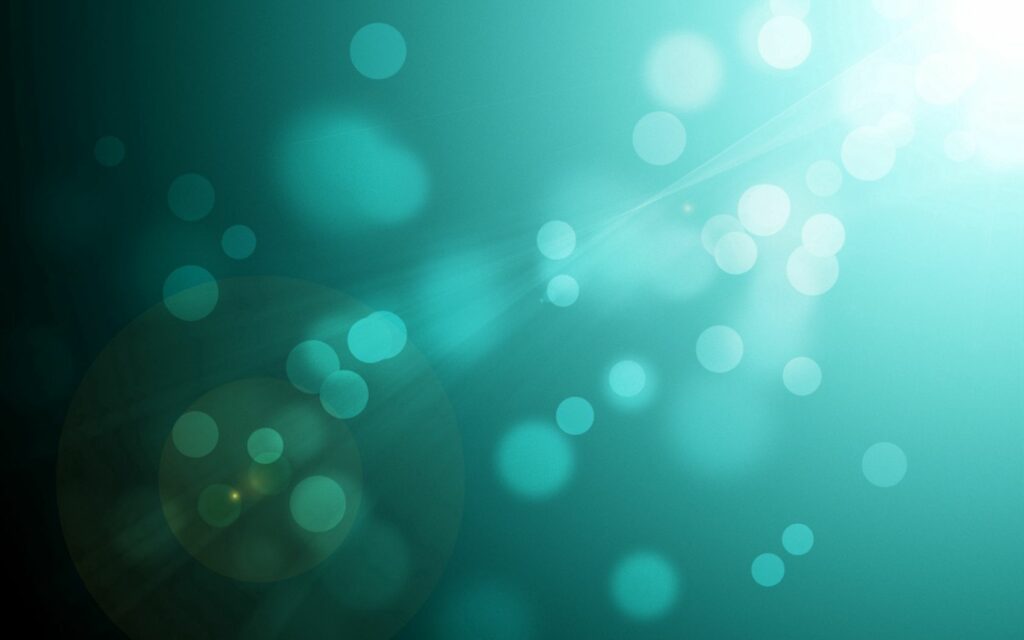 Tranquil Teal and Turquoise Wallpaper with Light Rays and Bokeh