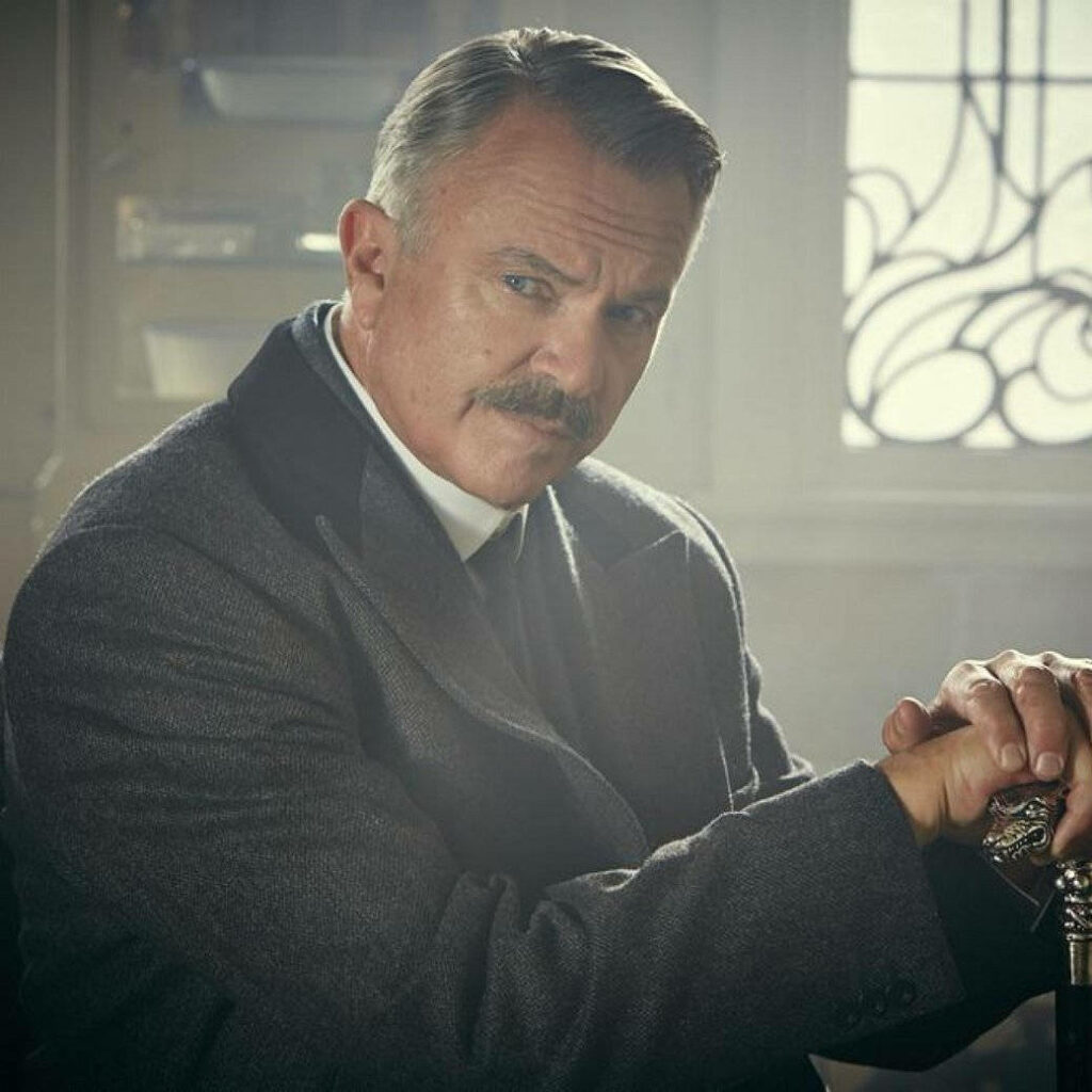 The Multifaceted Sam Neill: Unveiling the Enigmatic Inspector Campbell from Peaky Blinders in a Captivating Backdrop Wallpaper