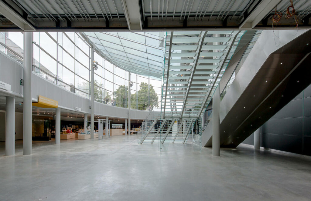 Modern Van Gogh Museum Interior: Sleek Design & Natural Light Wallpaper