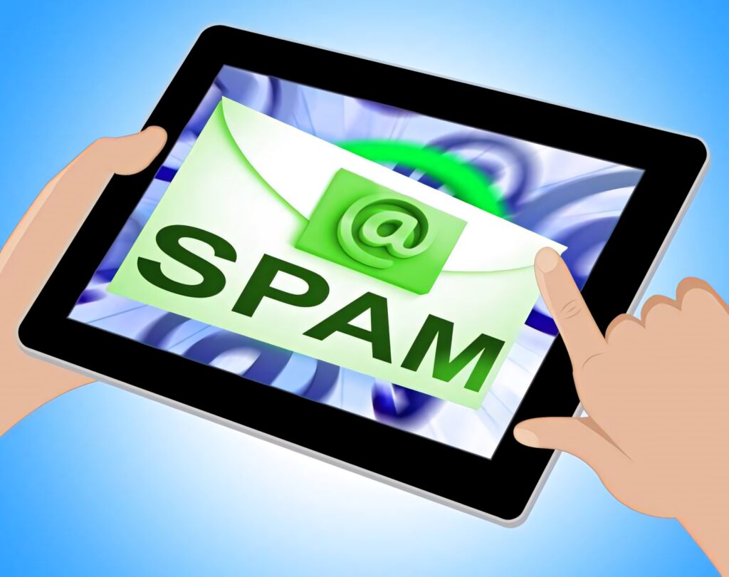 Mobile phone screen with green spam email alert on blue background highlighting cybersecurity risks Wallpaper