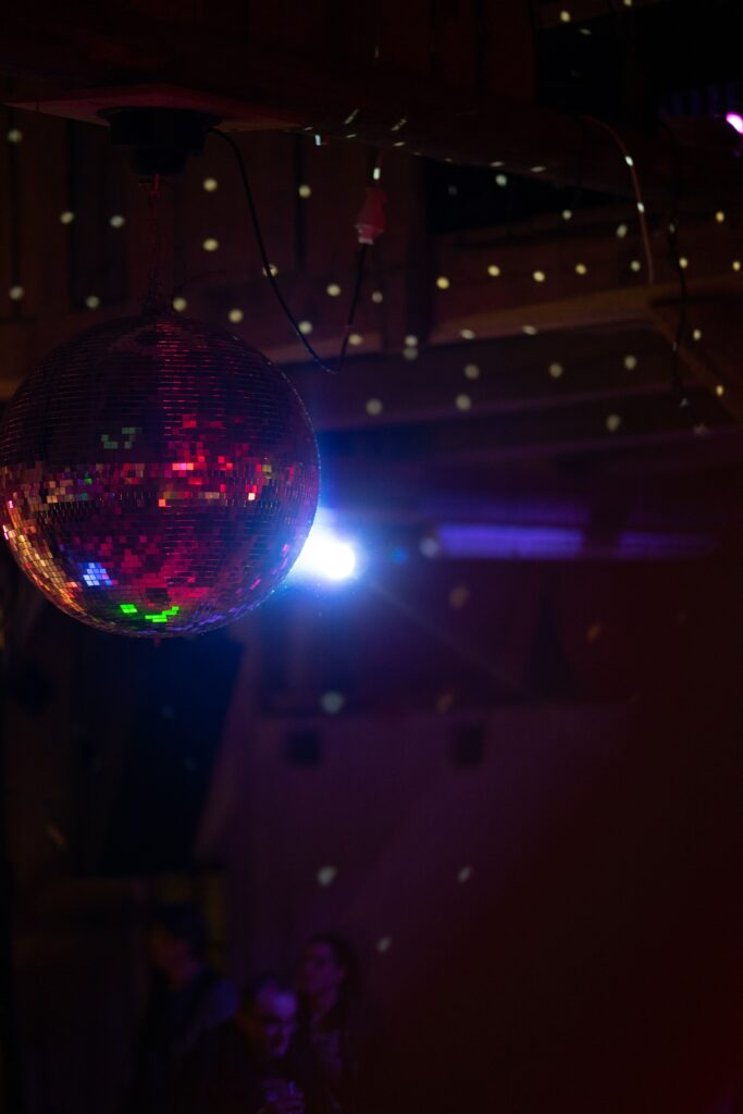 Colorful Disco Ball Wallpaper: Reflective Retro Atmosphere