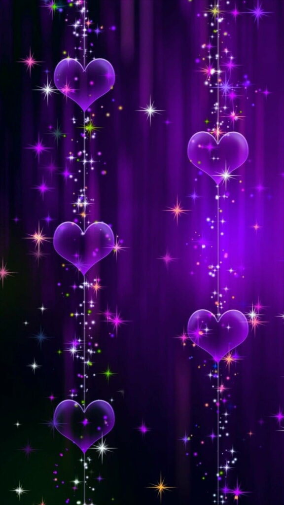 Glowing Love: A Mesmerizing Wallpaper of Sparkling Purple Hearts